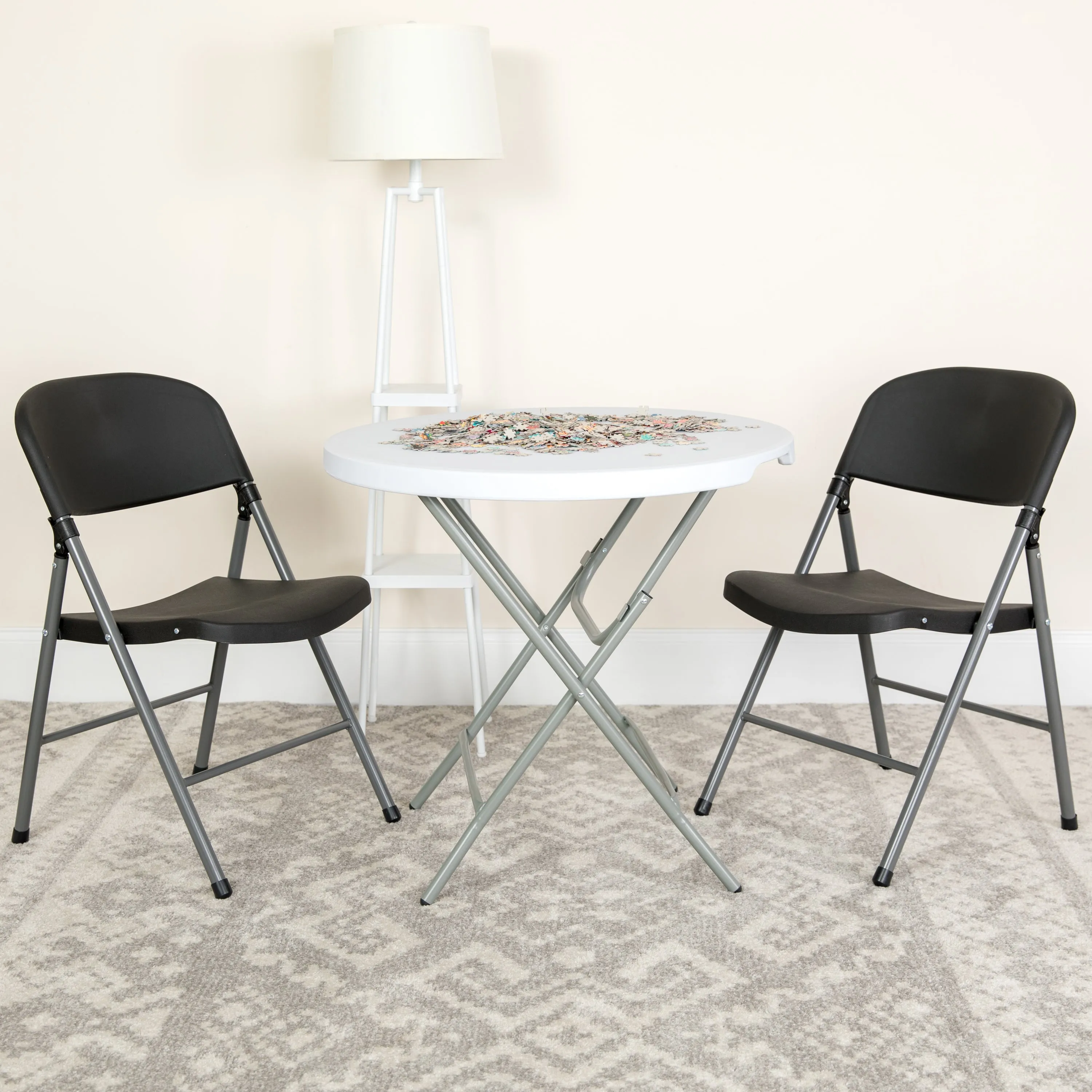 2 Pack HERCULES Series 330 lb. Capacity Black Plastic Folding Chair with Charcoal Frame